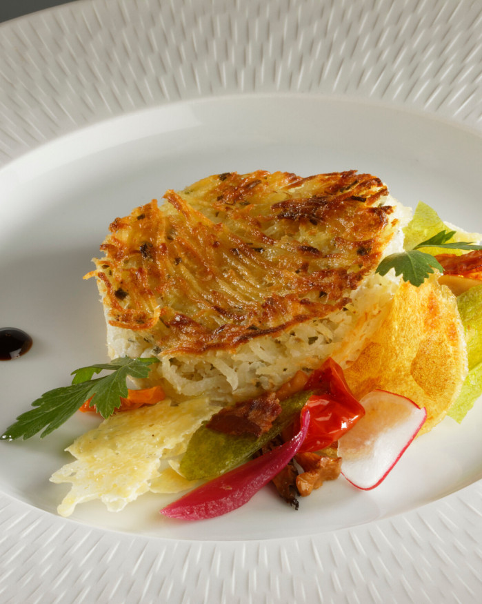 Tatin de pomme paille aux fines herbes